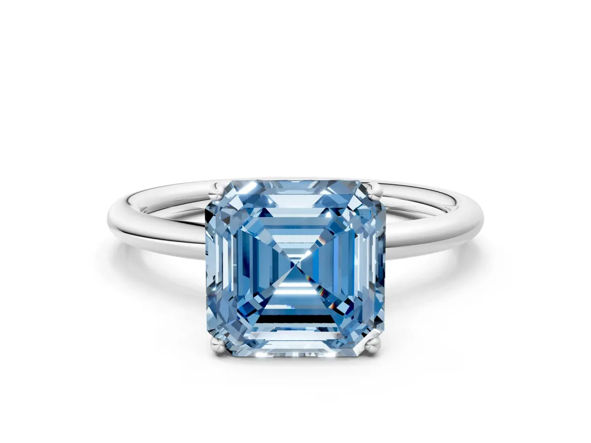 Fancy Blue Asscher Cut Solitaire Diamond Ring with a Classic Band and Four-Prong Setting Platinum