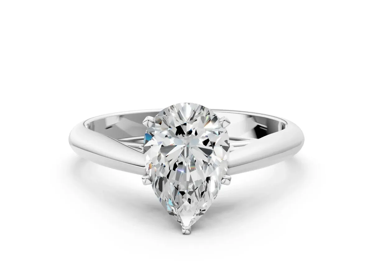 Pear Cut Diamond Solitaire Engagement Ring with Cathedral Setting and Four-Prong Mount White gold