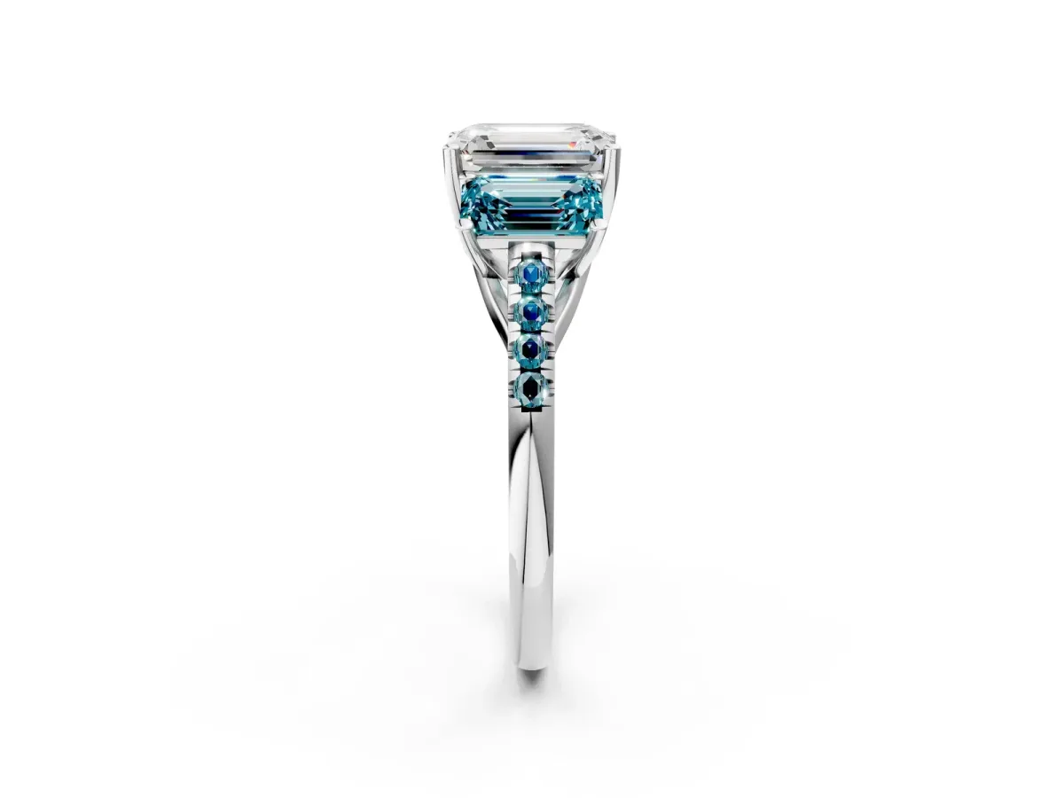 Three-Stone Emerald Cut Diamond Ring with Round Blue Topaz Pavé Band and Prong Setting Silver