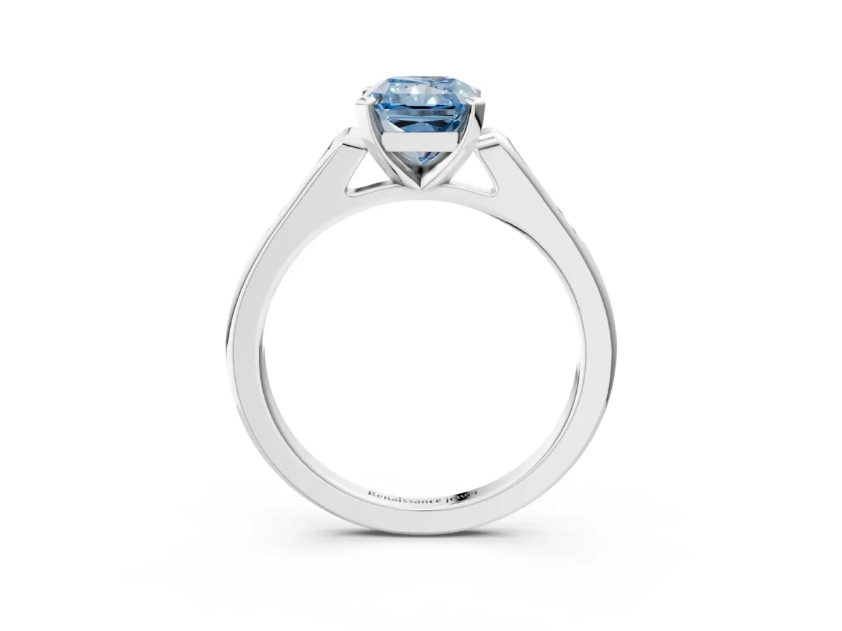Fancy Blue Radiant Cut Diamond Solitaire Ring with Channel Set Round Band and Prong Setting Silver