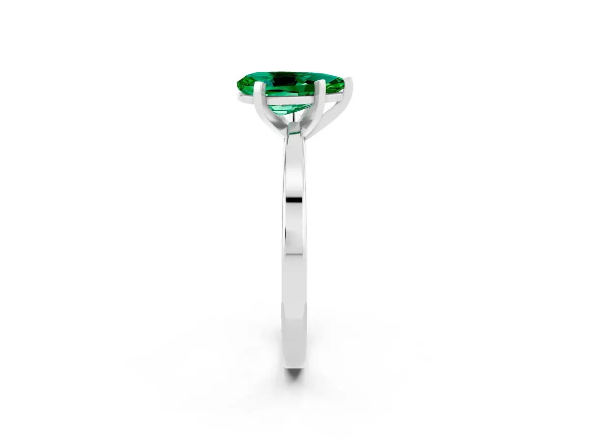 Pear Cut Emerald Solitaire Engagement Ring with Classic Band and Four-Prong Setting Silver