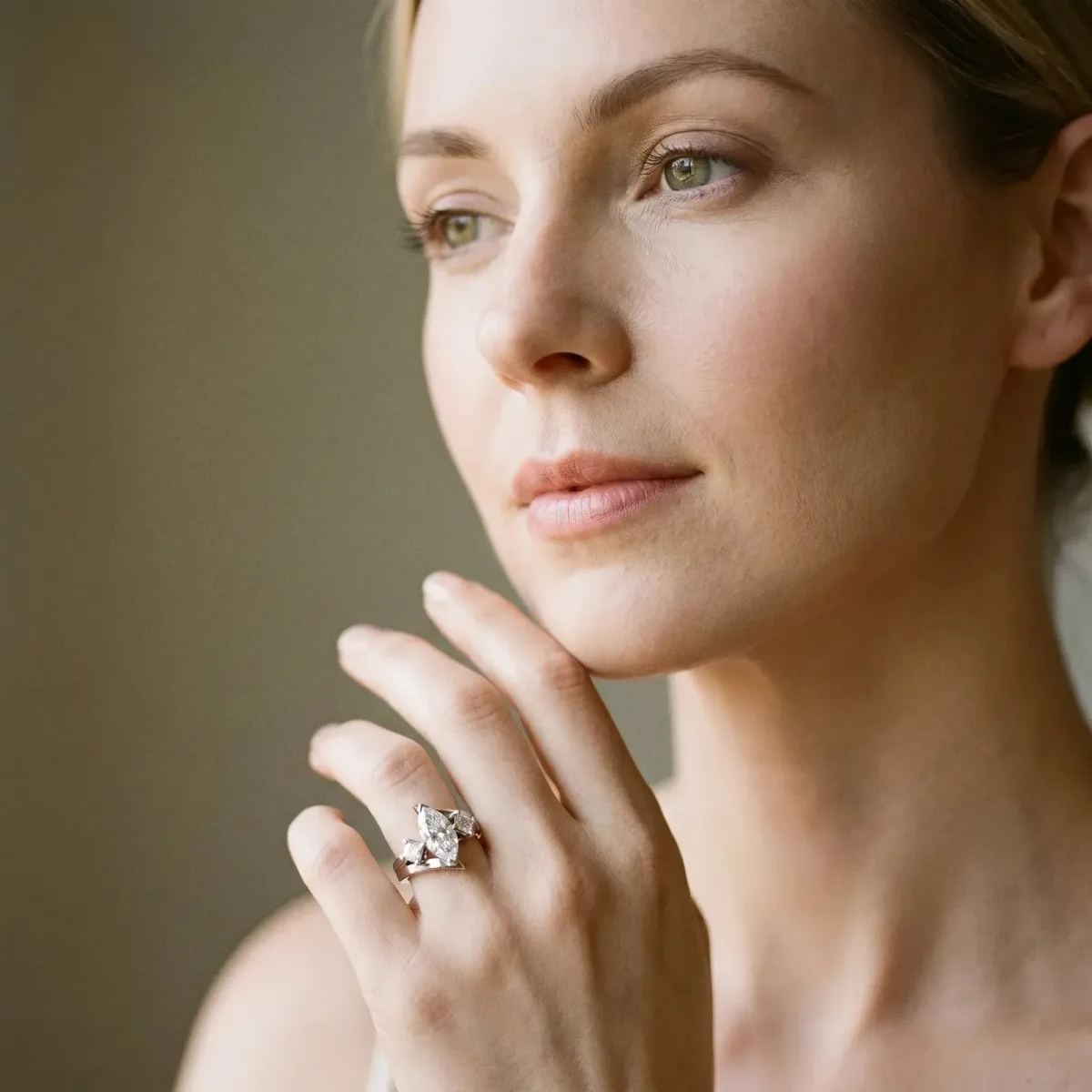 Three-Stone Marquise Cut Cut Tension Band Ring with Four-Prong Setting Platinum