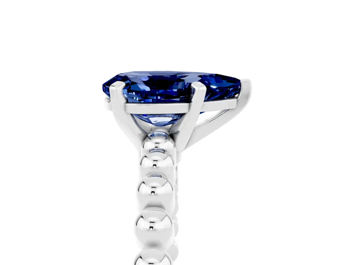 Pear Cut Blue Sapphire Solitaire Ring with Beaded Band and Prong Setting White gold