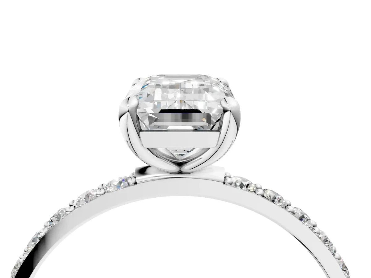 Emerald Cut Diamond Solitaire Ring with Round Pavé Band and Prong Setting Silver