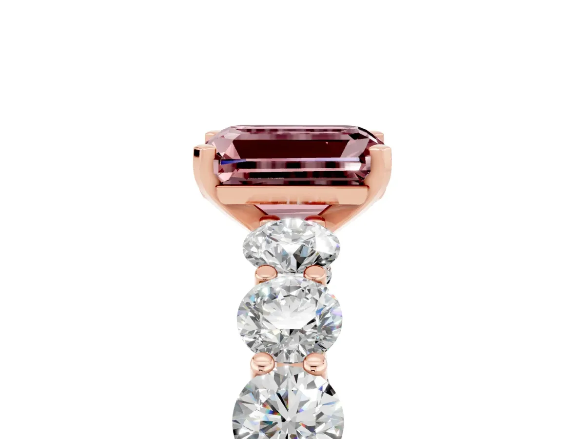 Emerald Cut Morganite Prong Setting with Side Stones on a Pave Band Rose gold