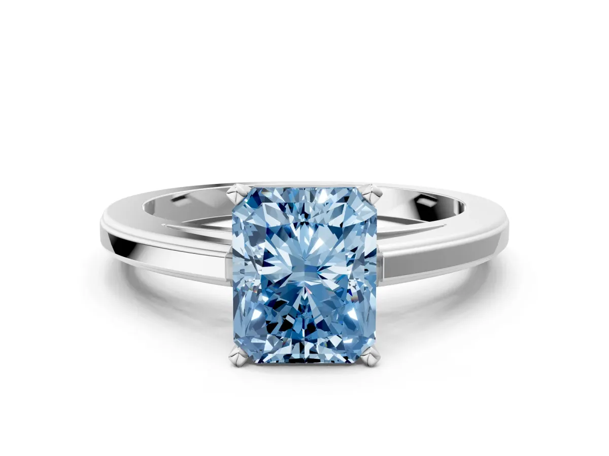 Fancy Blue Radiant Cut Solitaire Diamond Ring with Four-Prong Setting and Classic Band Platinum