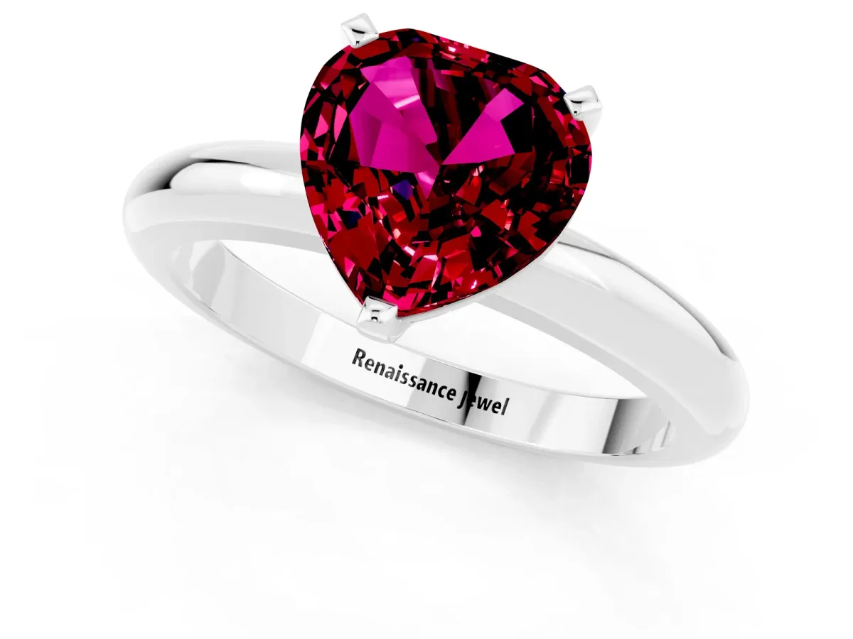 Heart Cut Garnet Solitaire Engagement Ring with Round Band and Four-Prong Setting Silver