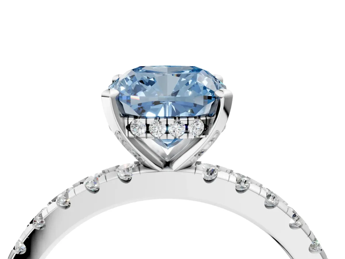 Fancy Blue Cushion Cut Diamond Solitaire Ring with Round Pavé Band and Four-Prong Setting Silver