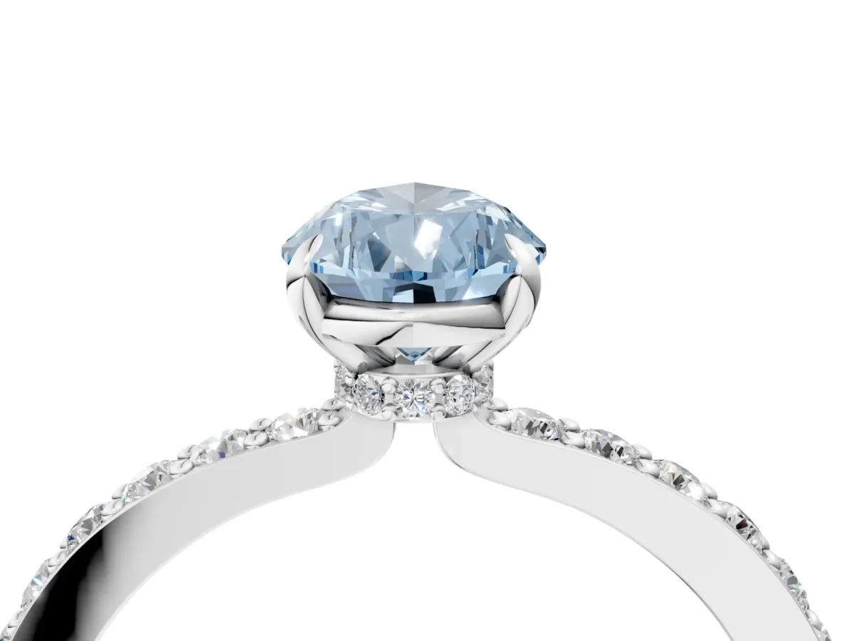 Fancy Blue Pear Cut Diamond Solitaire Engagement Ring with Pavé Band and Four-Prong Setting Silver