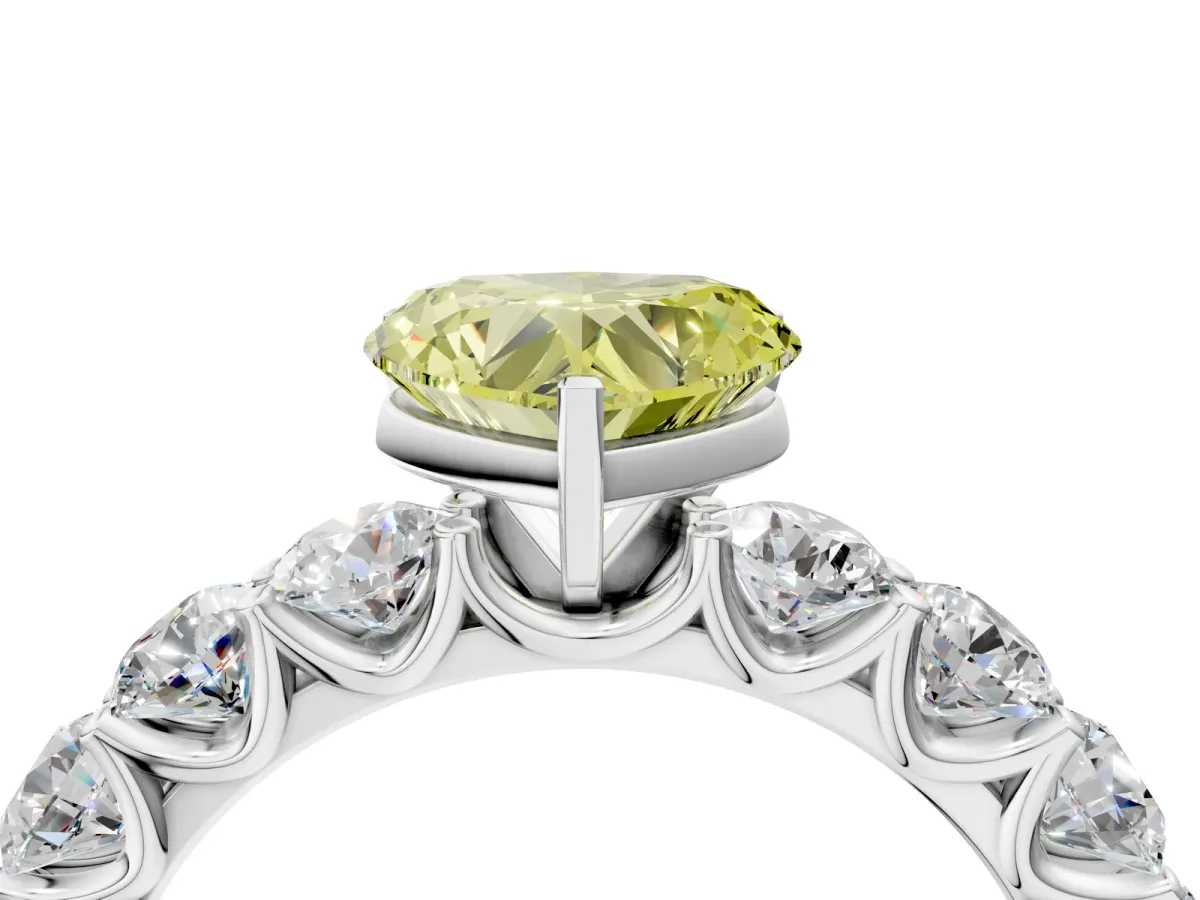 Fancy Yellow Heart Cut Diamond Prong Setting with Side Stones on a Pave Band Silver