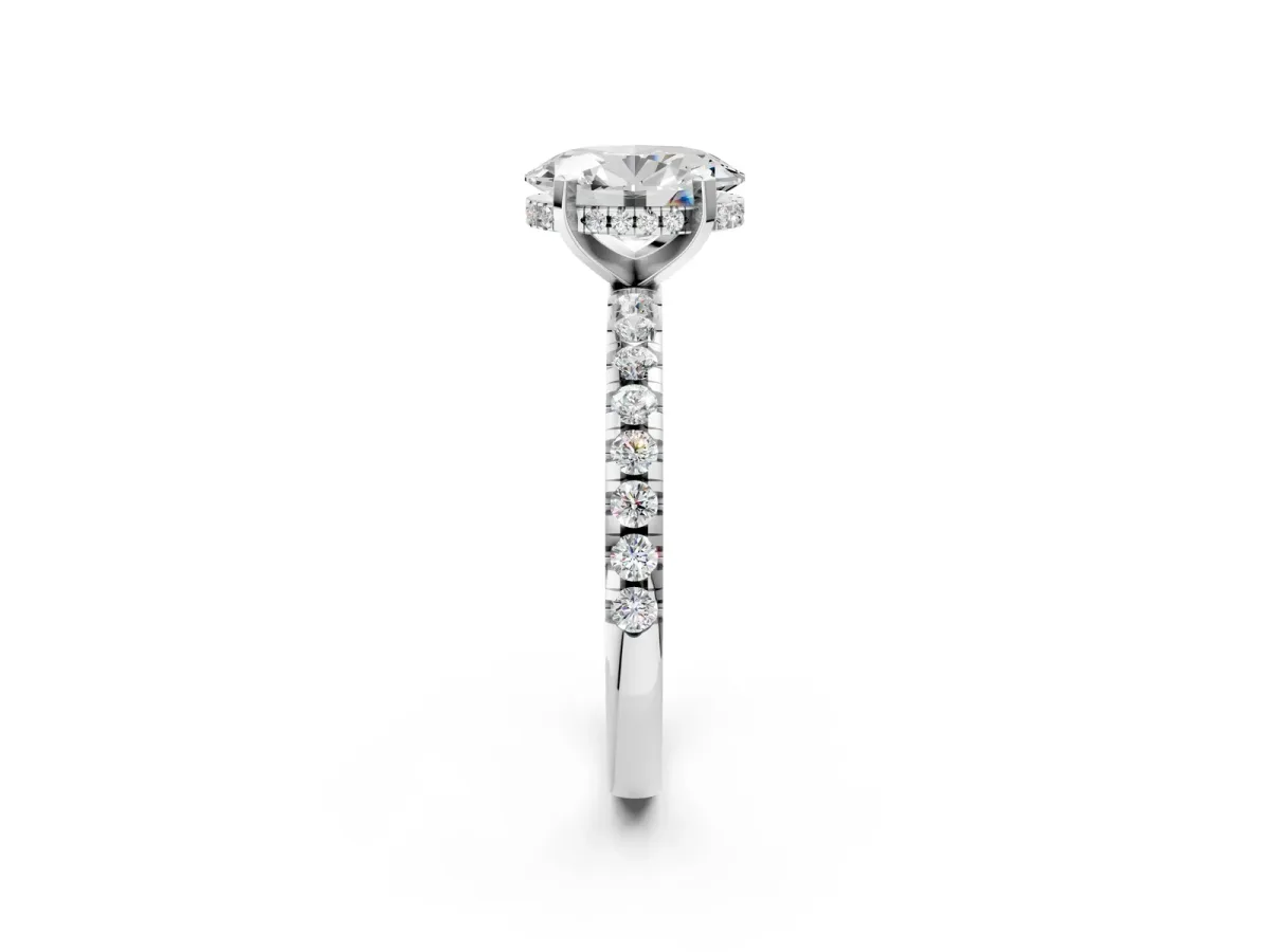 Oval Cut Diamond Solitaire Ring with Round Pavé Band and Four-Prong Setting Silver