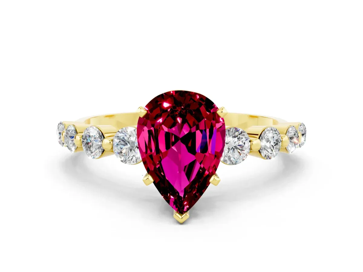 Pear Cut Solitaire Garnet Ring with Pave Band and Four-Prong Setting Yellow gold