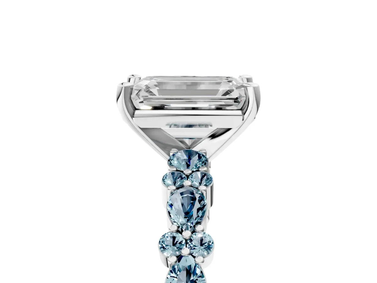 Emerald Cut Diamond Side Stone Solitaire Ring with Round Aquamarine and Four-Prong Setting Platinum