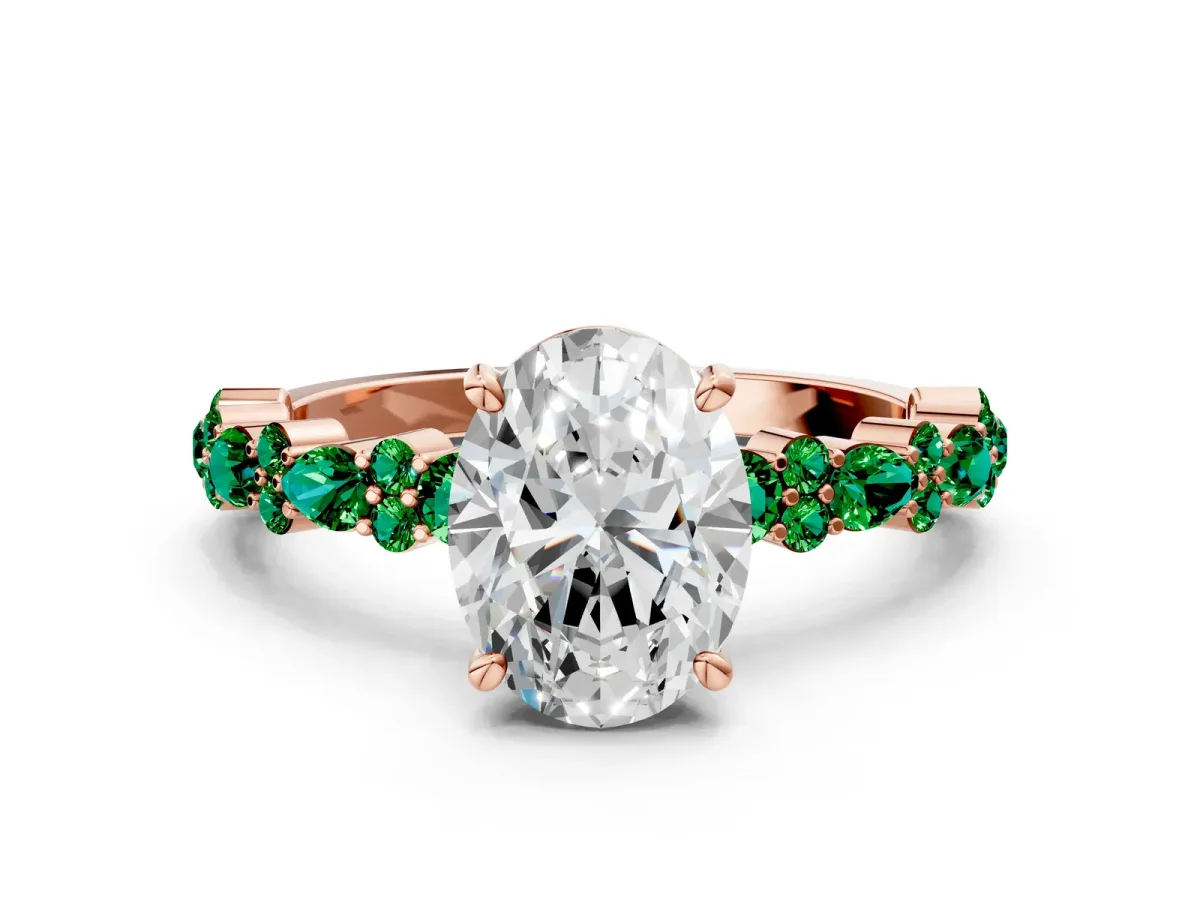 Oval Cut Diamond Side Stone Solitaire Ring with Round Emerald and Four-Prong Setting Rose gold
