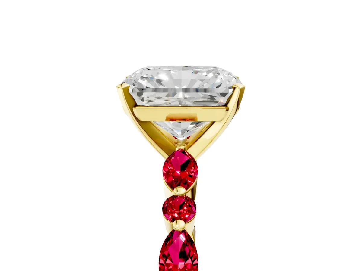 Radiant Cut Diamond Ring with Marquise and Round Ruby Side Stones and Four-Prong Setting Yellow gold