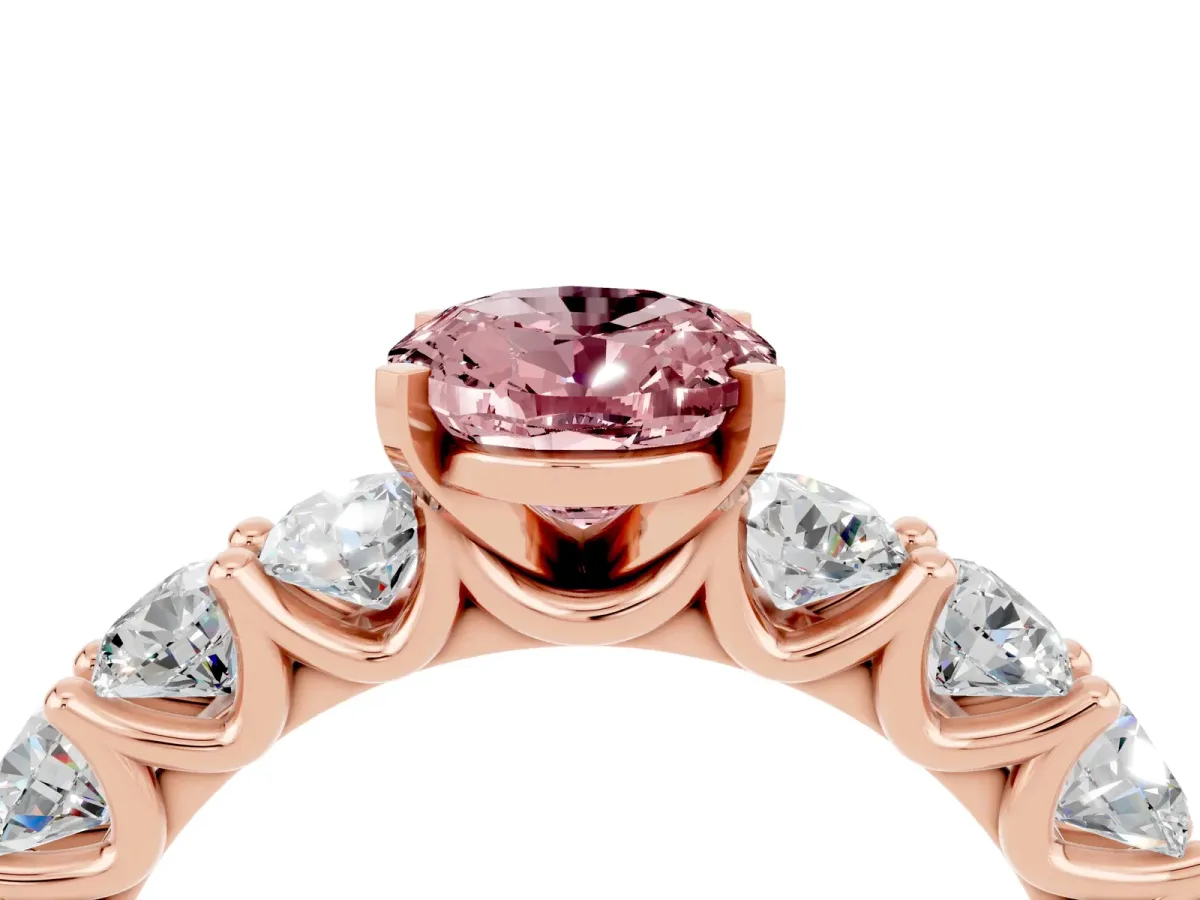 Oval Cut Morganite Prong Setting with Side Stones on a Pave Band Rose gold
