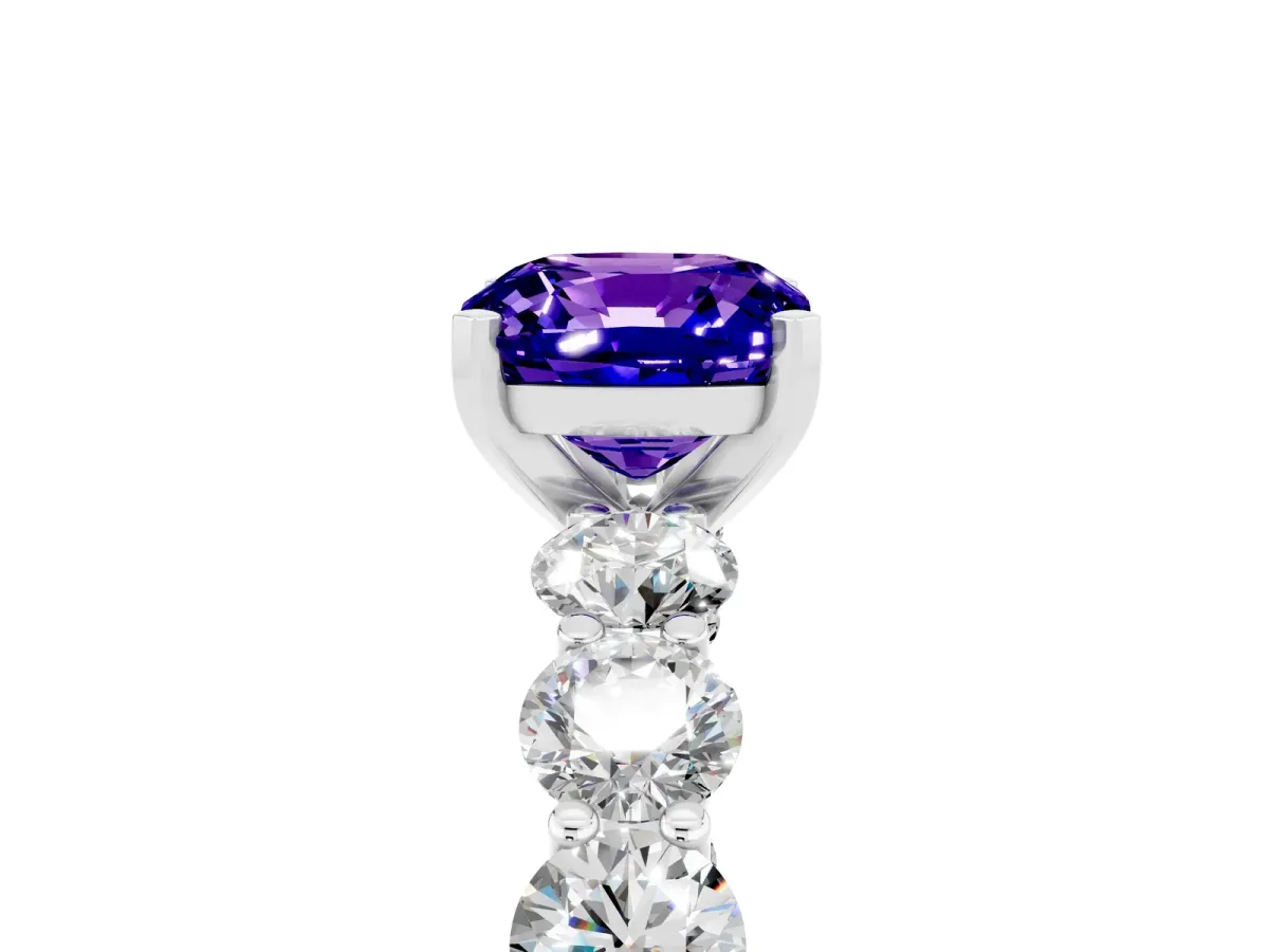 Cushion Cut Tanzanite Prong Setting with Side Stones on a Pave Band Silver