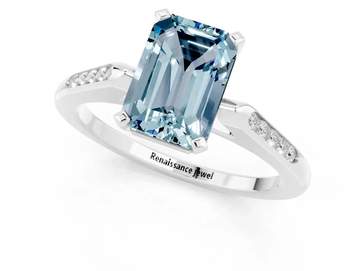 Emerald Cut Aquamarine Solitaire Ring with Channel Set Round Band and Prong Setting Silver