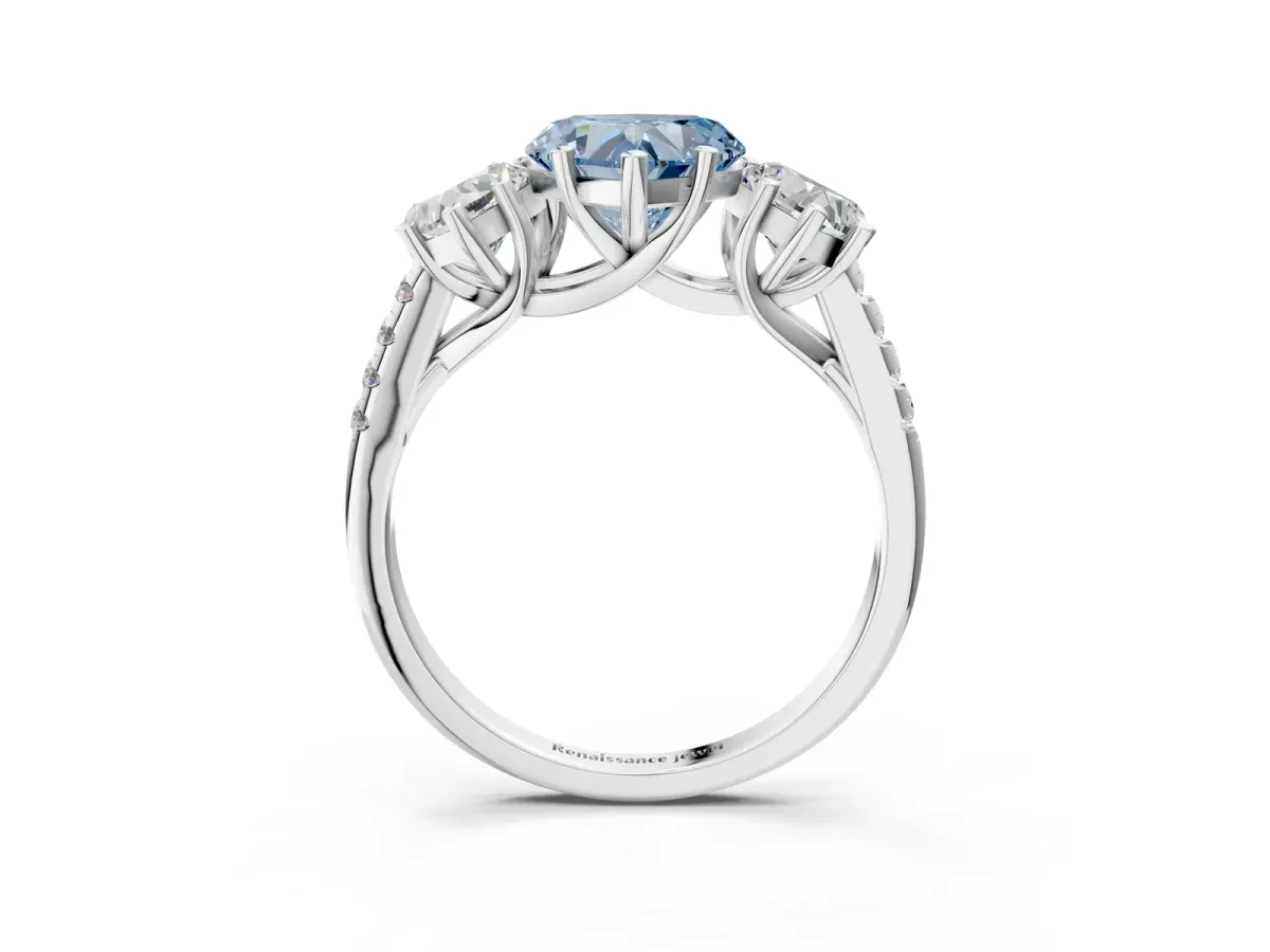 Fancy Blue Three-Stone Heart Cut Diamond Ring with Round Pavé Band and Prong Setting Silver