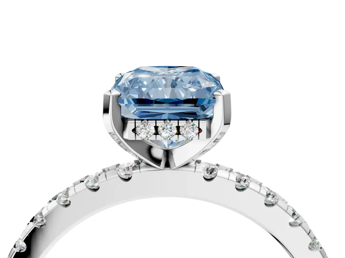Fancy Blue Radiant Cut Diamond Solitaire Ring with Round Pavé Band and Four-Prong Setting Silver