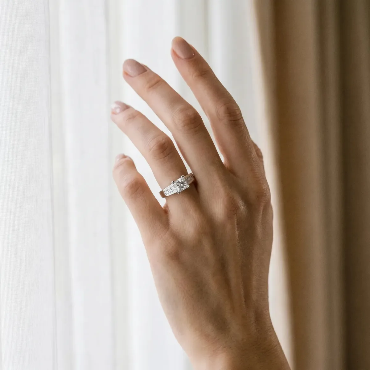 Princess Cut Cut Channel Set Solitaire Ring with Four-Prong Setting Silver