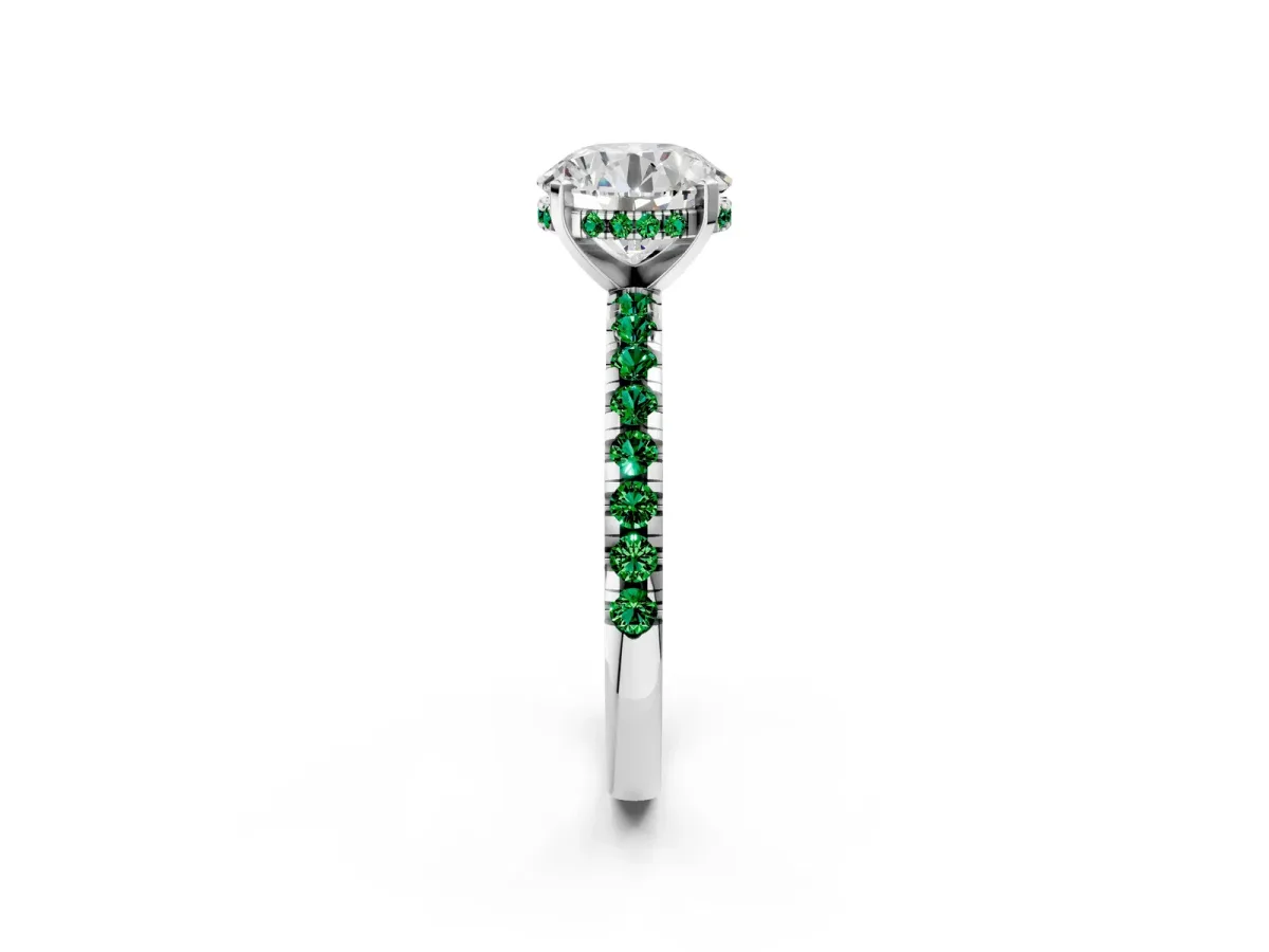 Round Cut Diamond Solitaire Ring with Round Emerald Pavé Band and Four-Prong Setting Silver