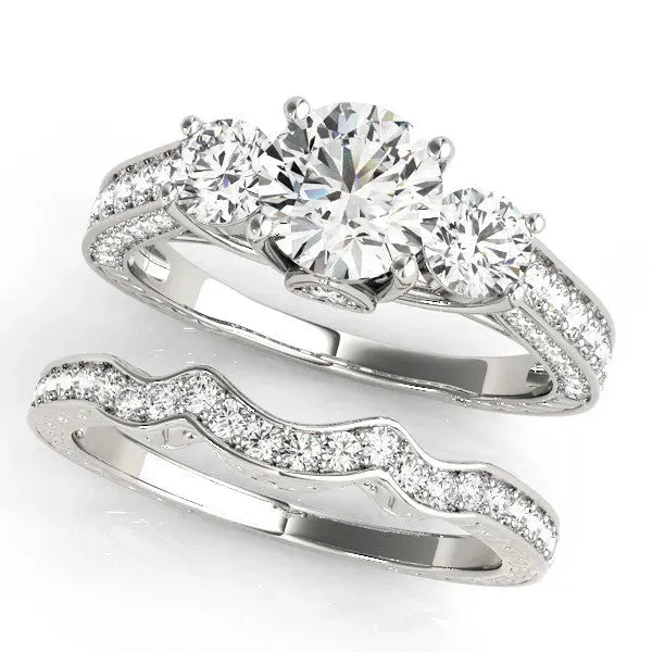 Three-Stone Round Cut Cut Diamond Engagement Ring with Split Shank and Prong Setting Platinum