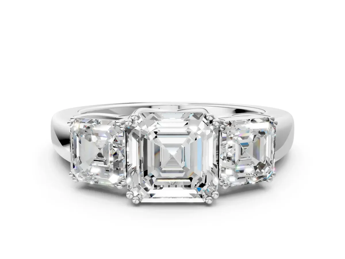 Three-Stone Asscher Cut Cut Diamond Ring with Channel Set Band and Four-Prong Setting White gold