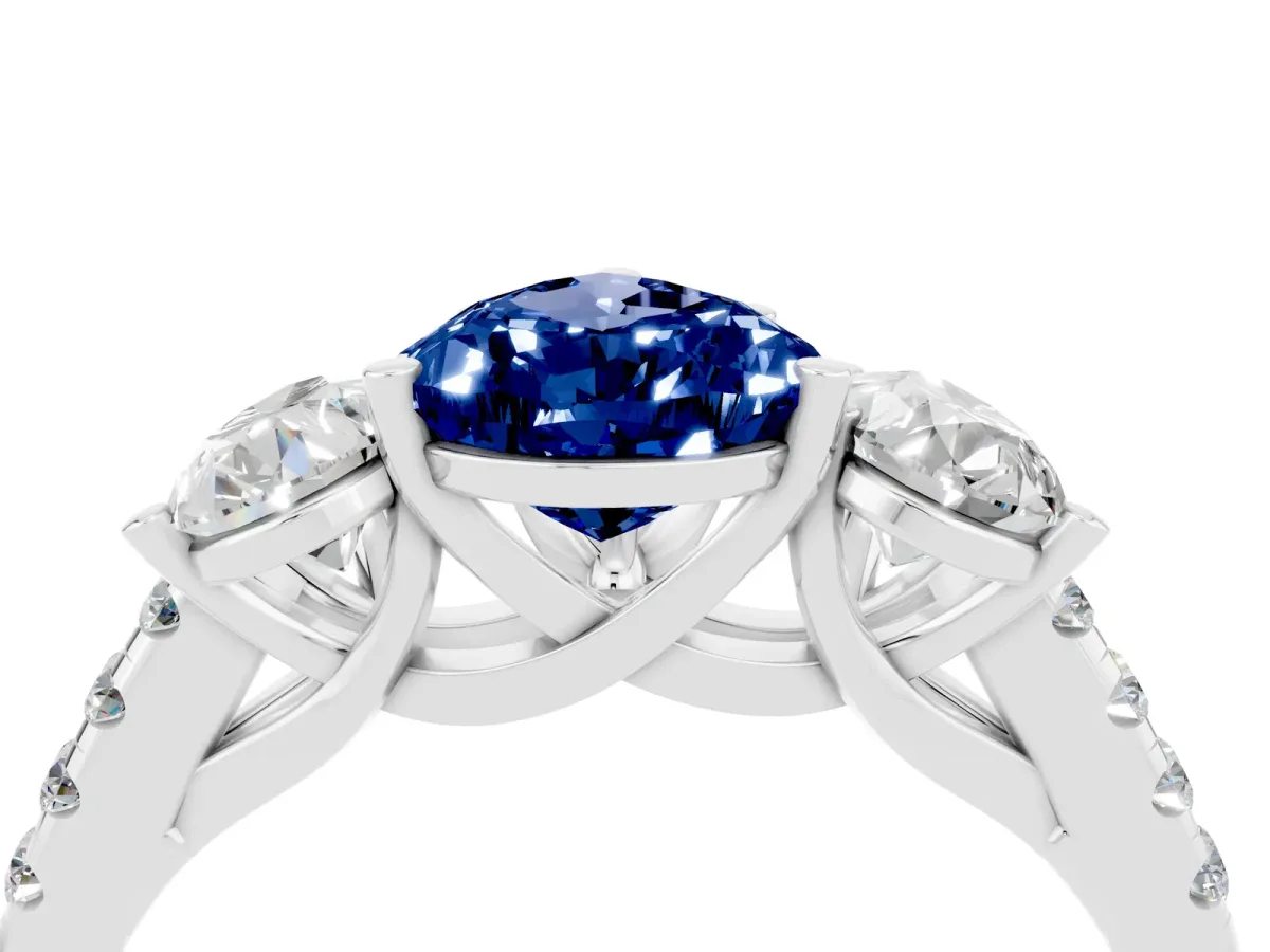 Three-Stone Pear Cut Blue Sapphire Ring with Round Pavé Band and Prong Setting Silver