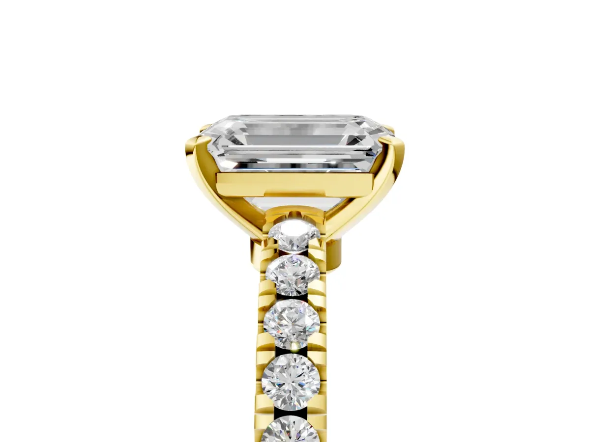 Emerald Cut Solitaire Diamond with Pavé Band and Four-Prong Setting Yellow gold