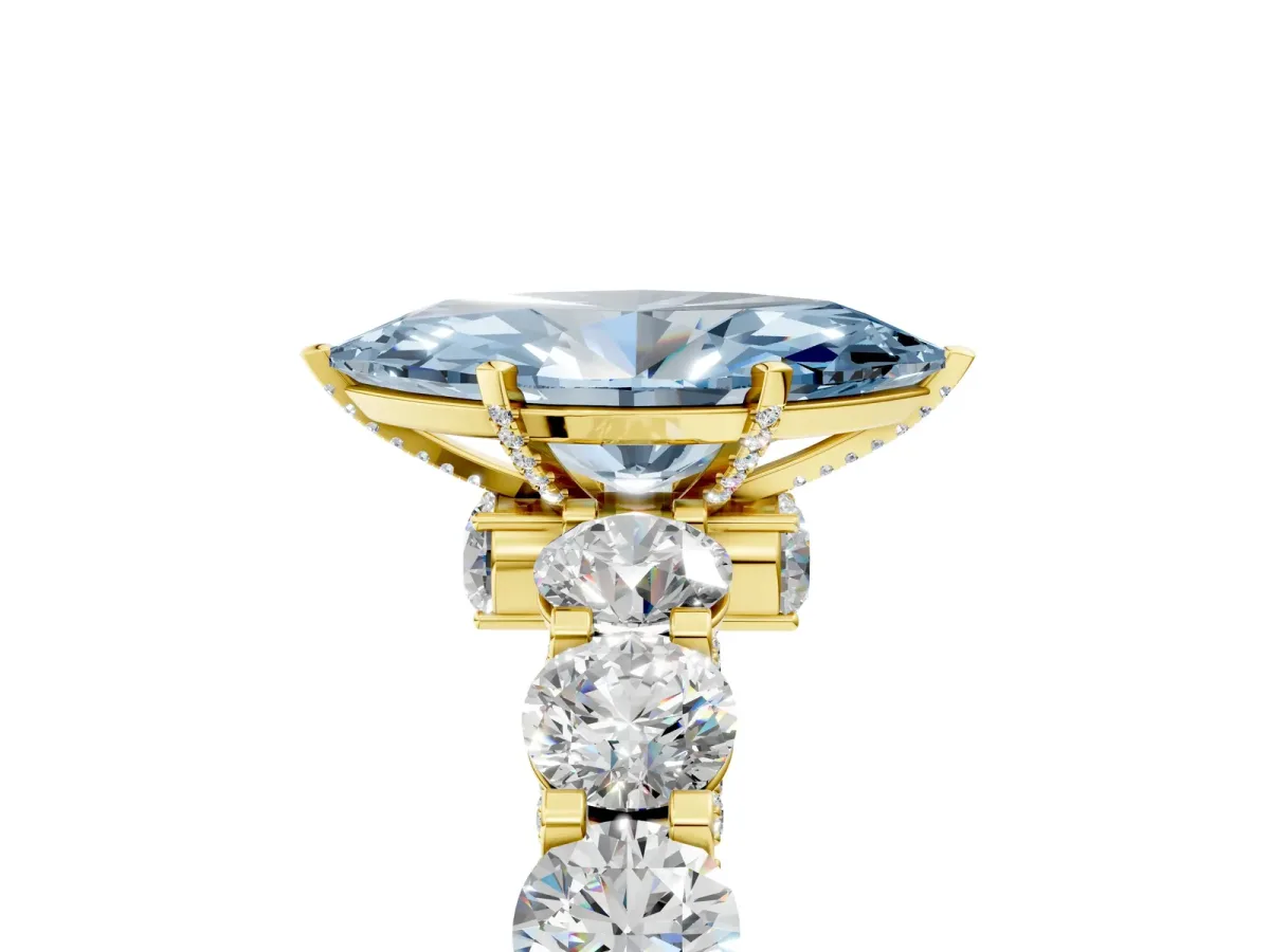 Fancy Blue Marquise Cut Diamond Side Stone Engagement Ring with Four-Prong Setting Yellow gold