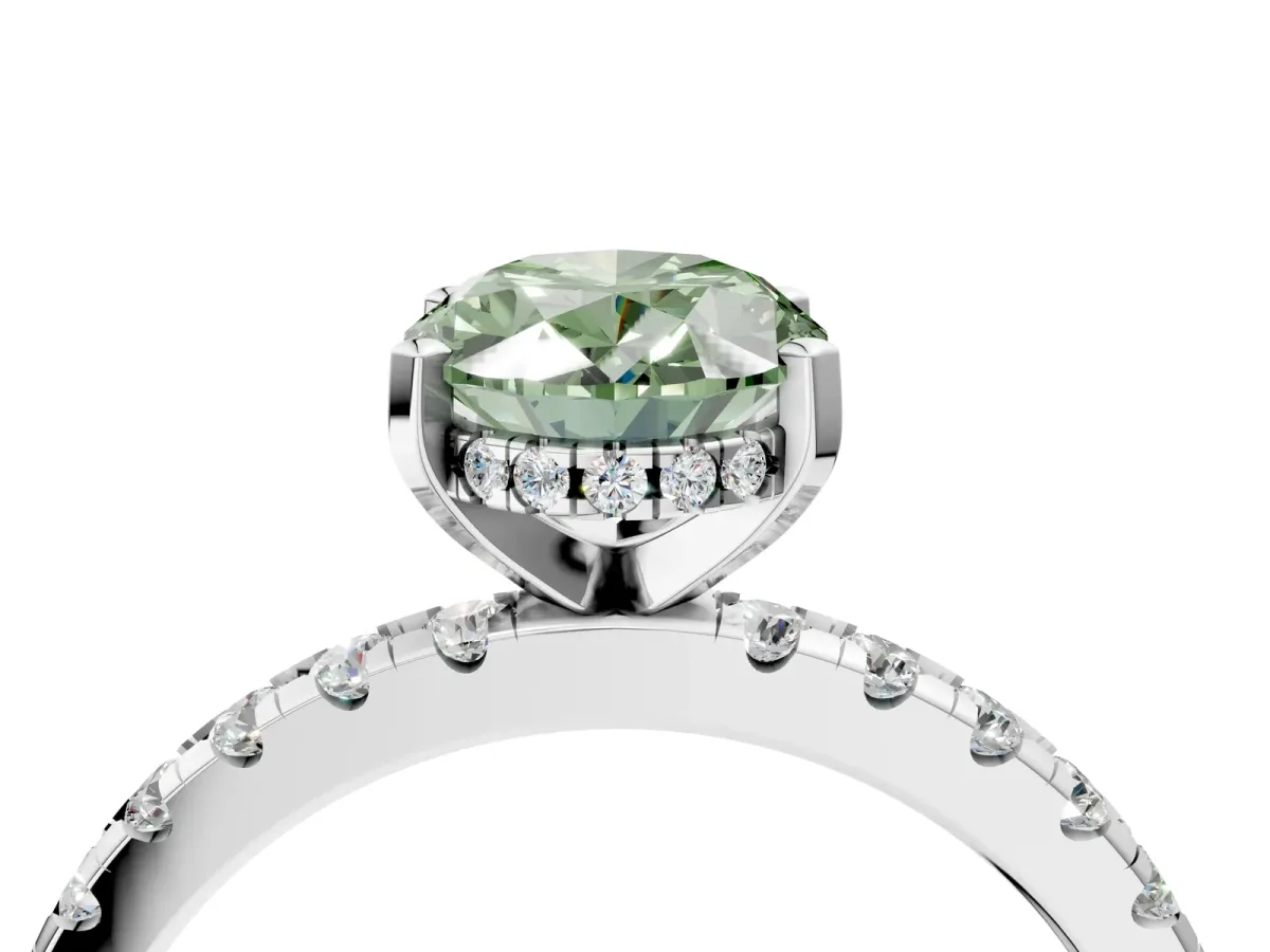 Fancy Green Oval Cut Diamond Solitaire Ring with Round Pavé Band and Four-Prong Setting Silver