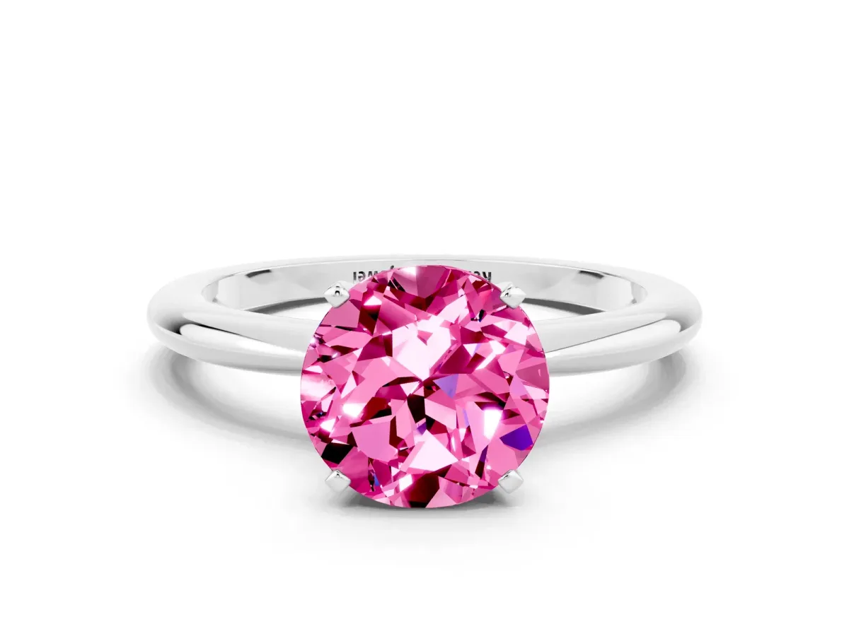 Round Cut Pink Sapphire Solitaire Ring with Six-Prong Setting and Classic Band Silver