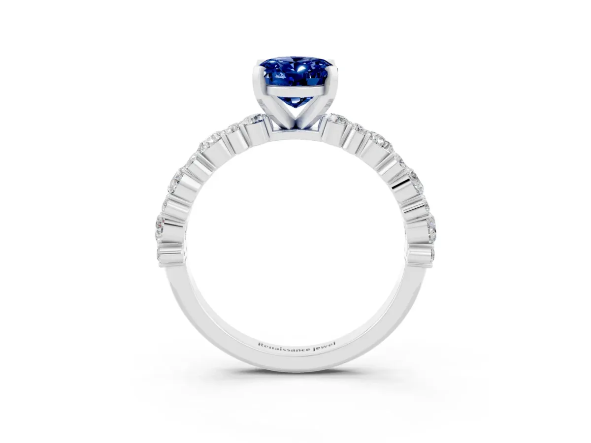 Oval Cut Blue Sapphire Side Stone Solitaire Ring with Round and Four-Prong Setting Platinum