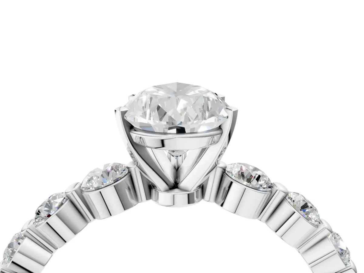 Pear Cut Solitaire Diamond Ring with Pave Band and Four-Prong Setting White gold