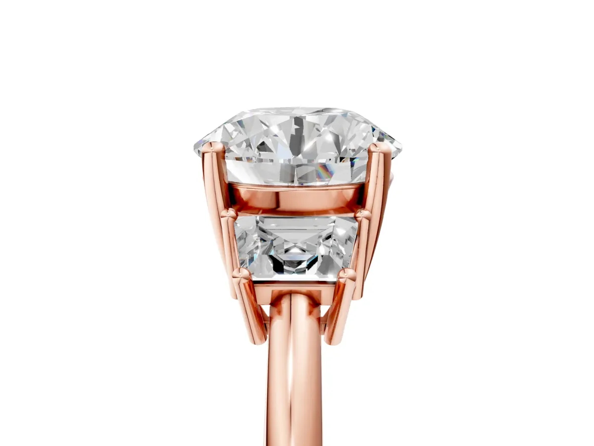 Round Cut Diamond Three-Stone Ring with Trapezoid Side Stones and Prong Setting Rose gold