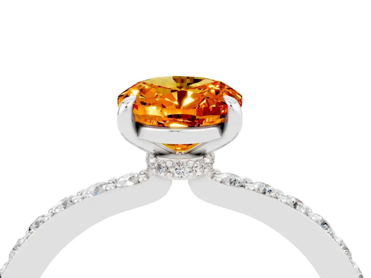 Oval Cut Citrine Solitaire Engagement Ring with Pavé Band and Four-Prong Setting Silver