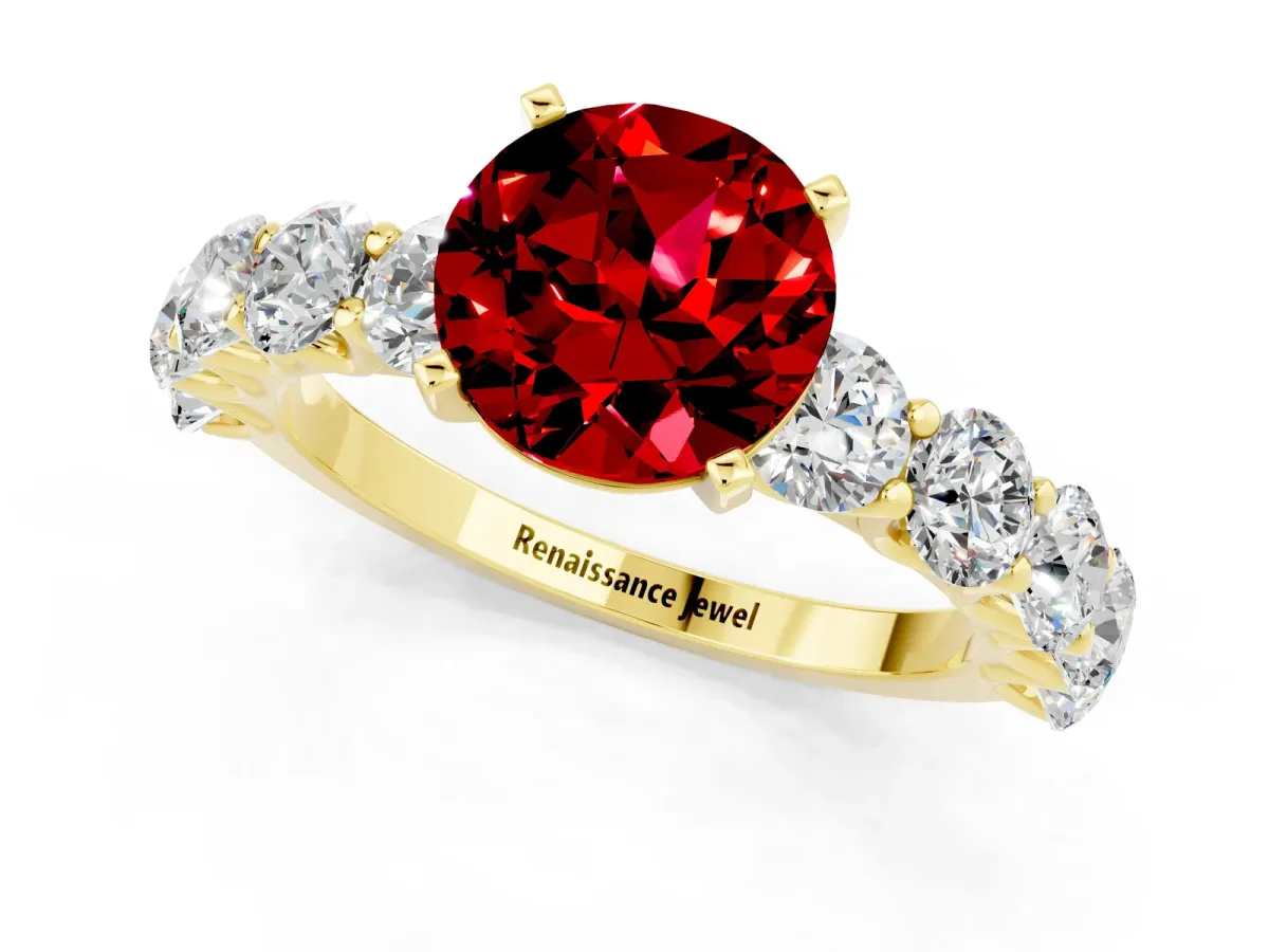 Round Cut Ruby Prong Setting with Side Stones on a Pave Band Yellow gold