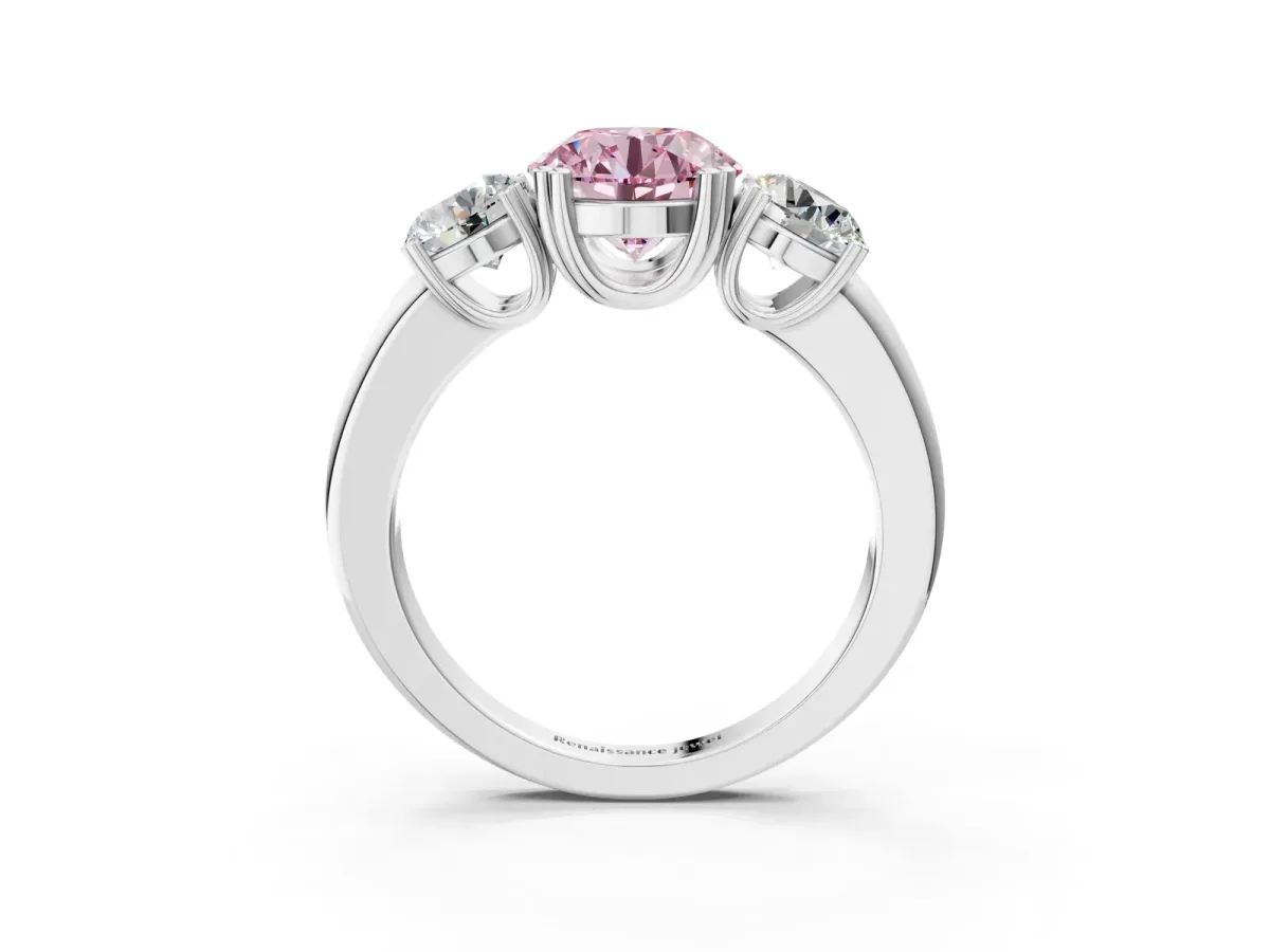 Fancy Pink Three-Stone Round Cut Cut Diamond Ring with Channel Set Band and Four-Prong Setting Silver