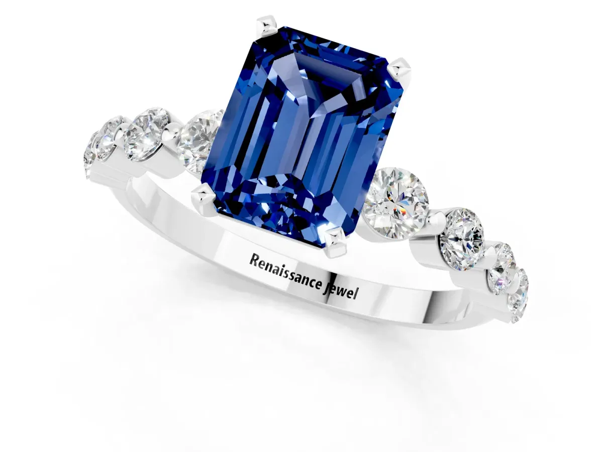 Emerald Cut Solitaire Blue Sapphire Ring with Pave Band and Four-Prong Setting Silver