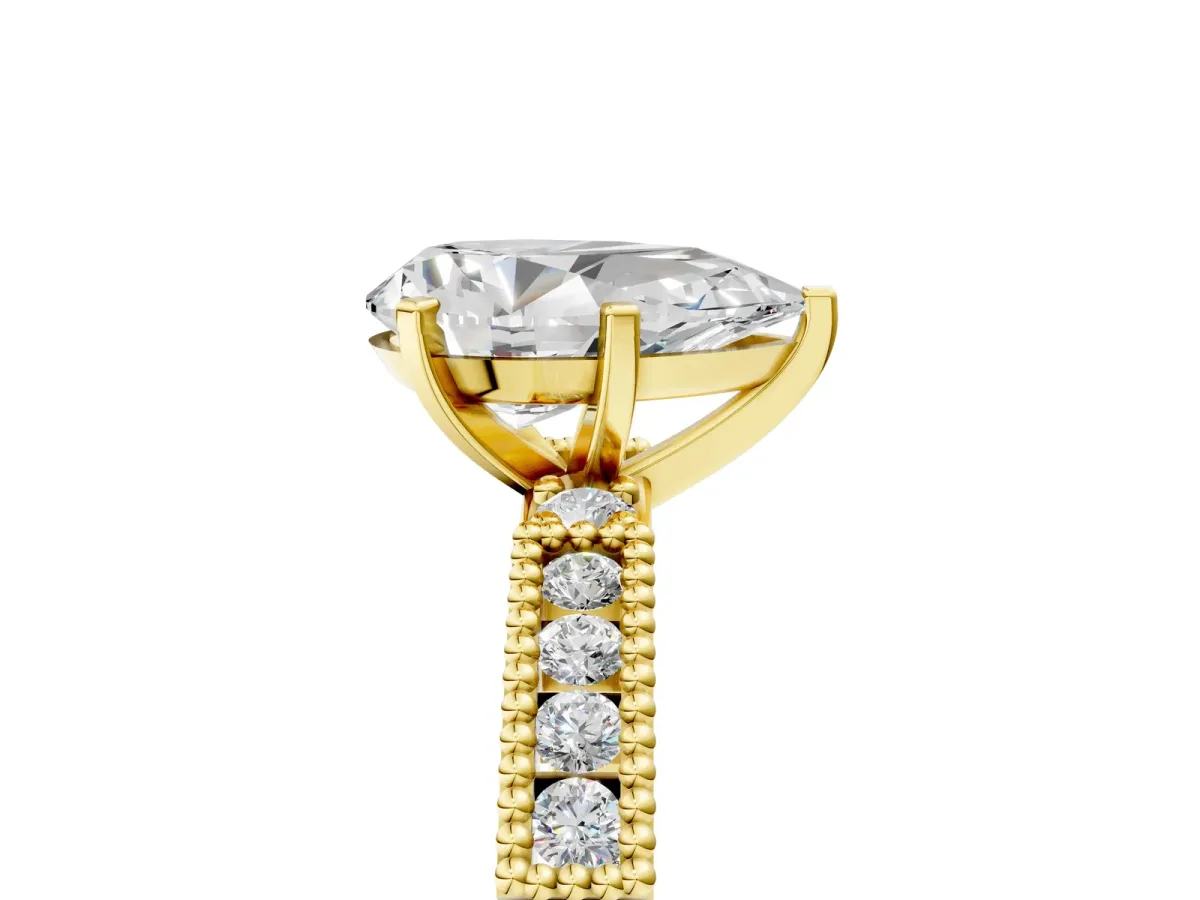 Pear Cut Solitaire with Pavé Band and Four-Prong Setting Yellow gold