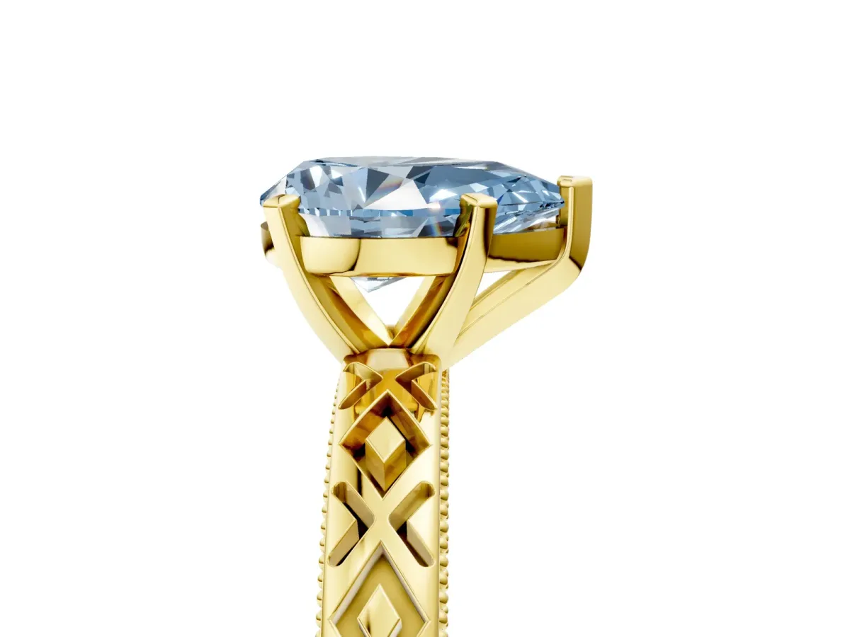 Fancy Blue Pear Cut Solitaire Diamond Ring with Milgrain and Black Enamel X Pattern Band Yellow gold