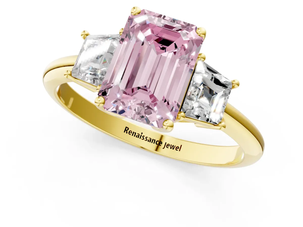 Fancy Pink Emerald Cut Diamond Three-Stone Ring with Trapezoid Side Stones and Prong Setting Yellow gold