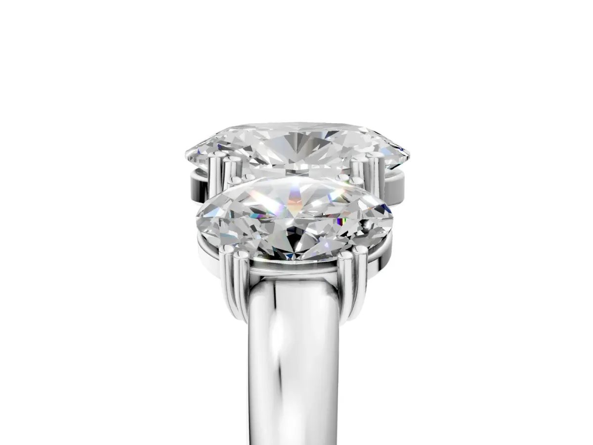 Three-Stone Oval Cut Cut Diamond Ring with Channel Set Band and Four-Prong Setting White gold
