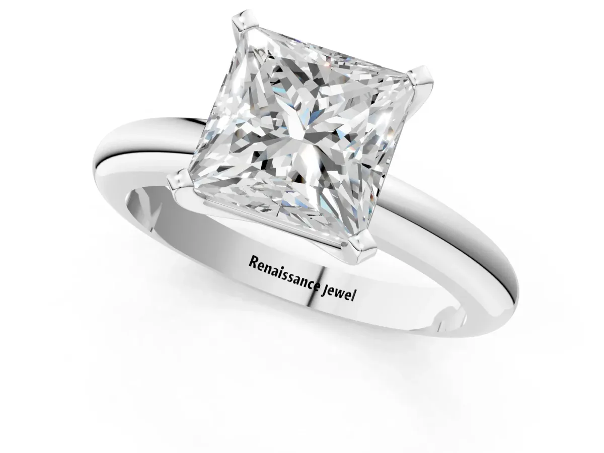 Princess Cut Diamond Solitaire Engagement Ring with Round Band and Four-Prong Setting Silver
