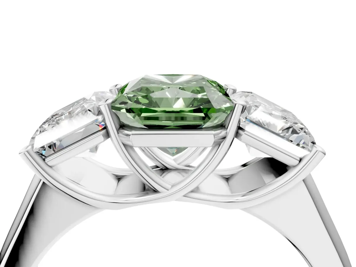 Fancy Green Radiant Cut Three-Stone Diamond Ring with Prong Setting on a Classic Band Platinum