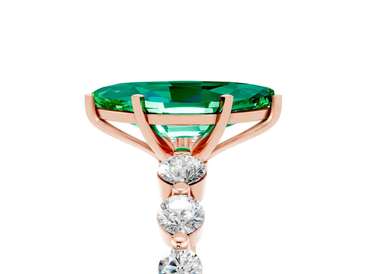 Marquise Cut Solitaire Emerald Ring with Pave Band and Four-Prong Setting Rose gold