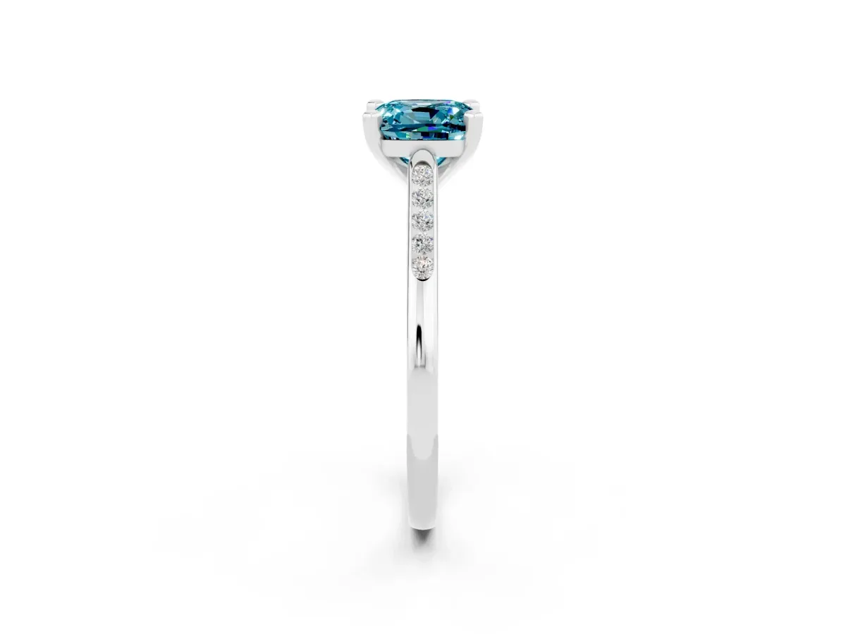 Cushion Cut Blue Topaz Solitaire Ring with Channel Set Round Band and Prong Setting Silver