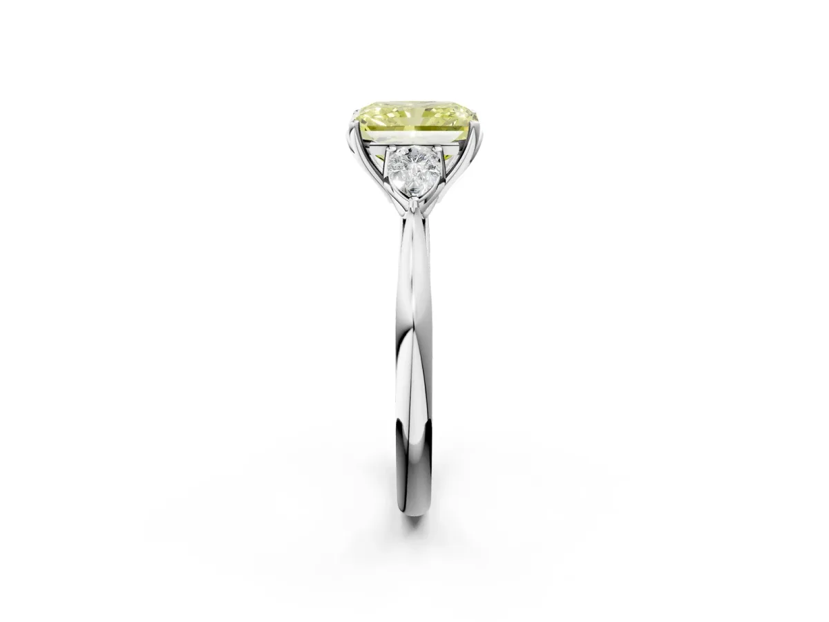 Fancy Yellow Three-Stone Radiant Cut Diamond Ring with Pear Side Stones in Four-Prong Setting Platinum