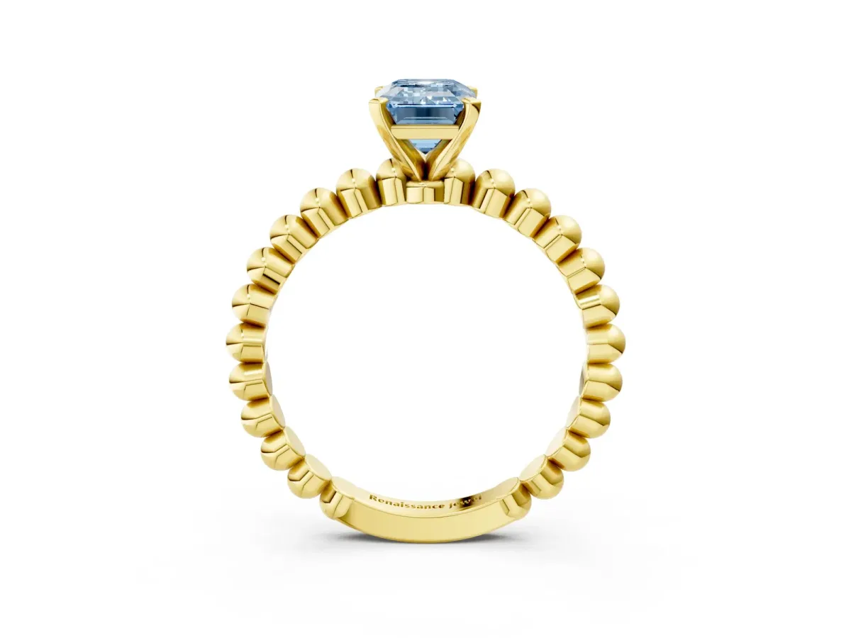 Fancy Blue Emerald Cut Diamond Solitaire Ring with Beaded Band and Prong Setting Yellow gold